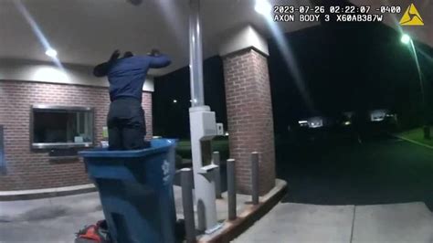 Watch: Ohio bank burglary suspect falls from ceiling, lands in recycling can near officers